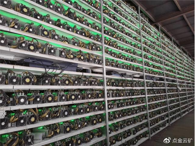 An expansive mining farm buzzing with activity, highlighting the organized setup for efficient crypto mining